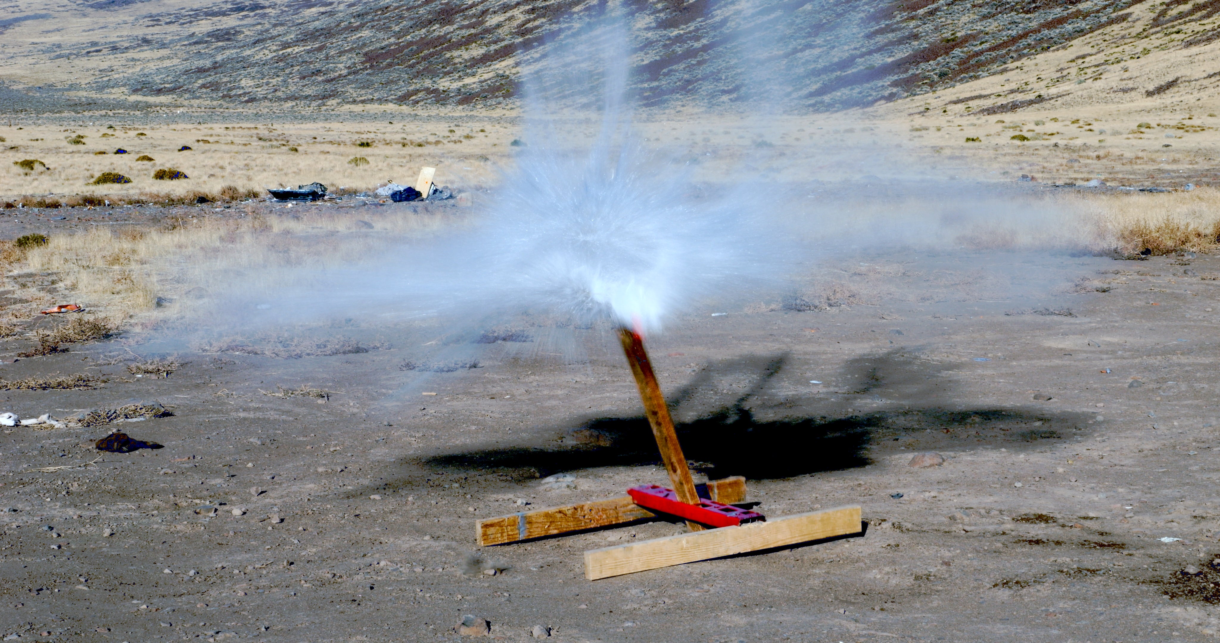 explosion from MultiTarget Stand, Steel and Paper Target Stand